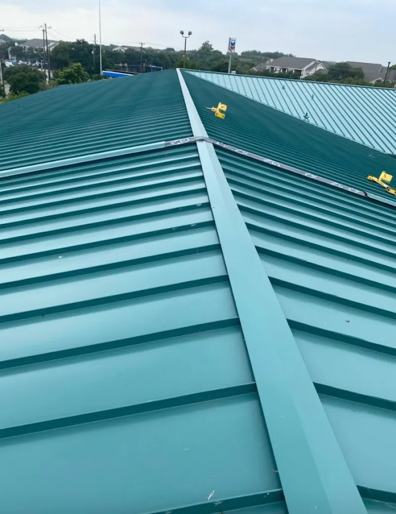 Green commercial metal roof ridge and valley for Metal Roof Repair in Terrell Hills