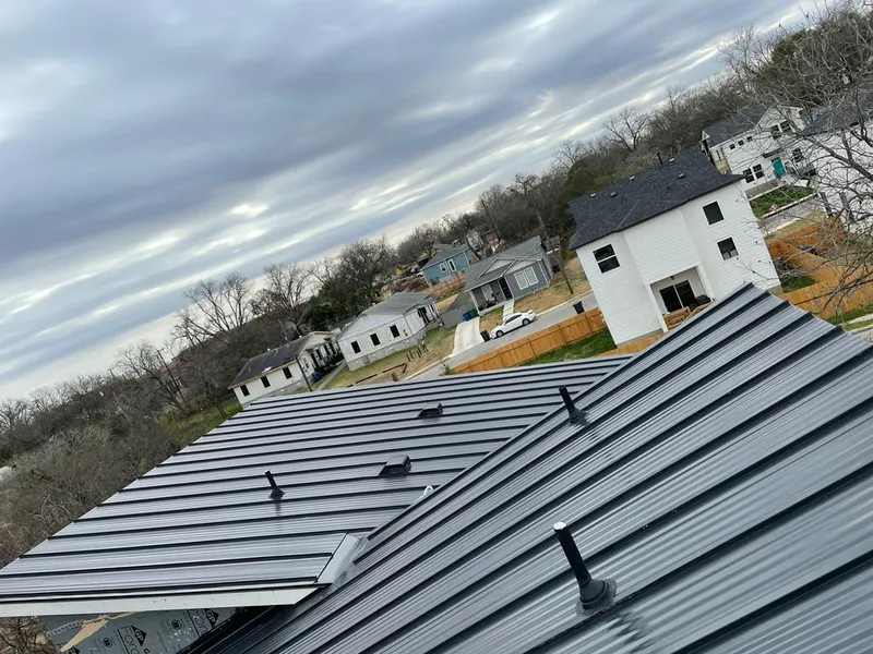 Standing seam metal roof panels with vents for Skylight Repair in Terrell Hills